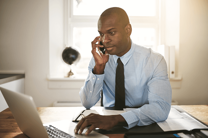 Compliance practitioner analyzing authorization forms.