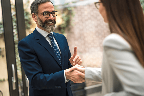 Business partners shaking hands