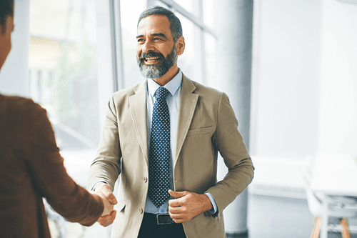 Human resource employees shaking hands 