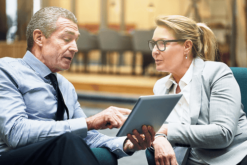 Businessmen working on a tablet