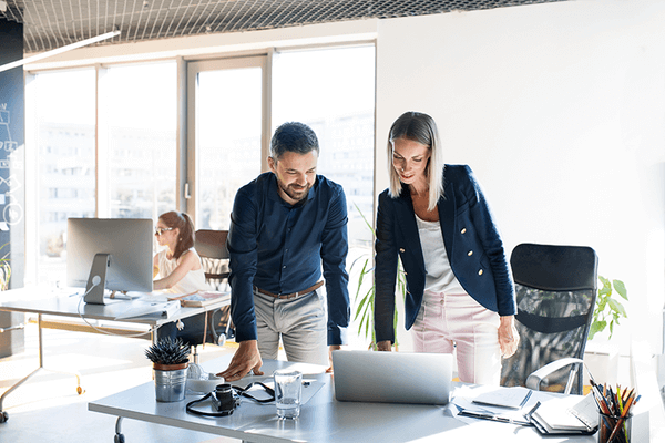 Colleagues working over a table