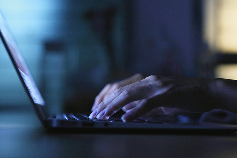 Hacker working on their computer